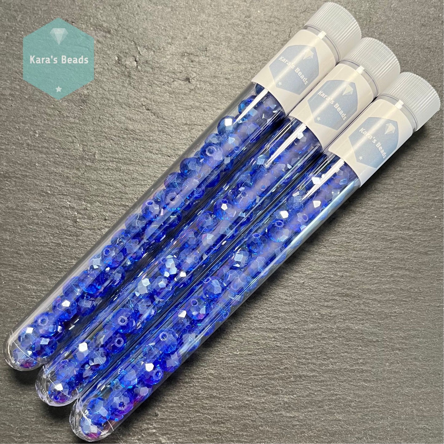 50pcs Tube 6x8 mm Rondelle Beads Transparent Royal Blue Luster