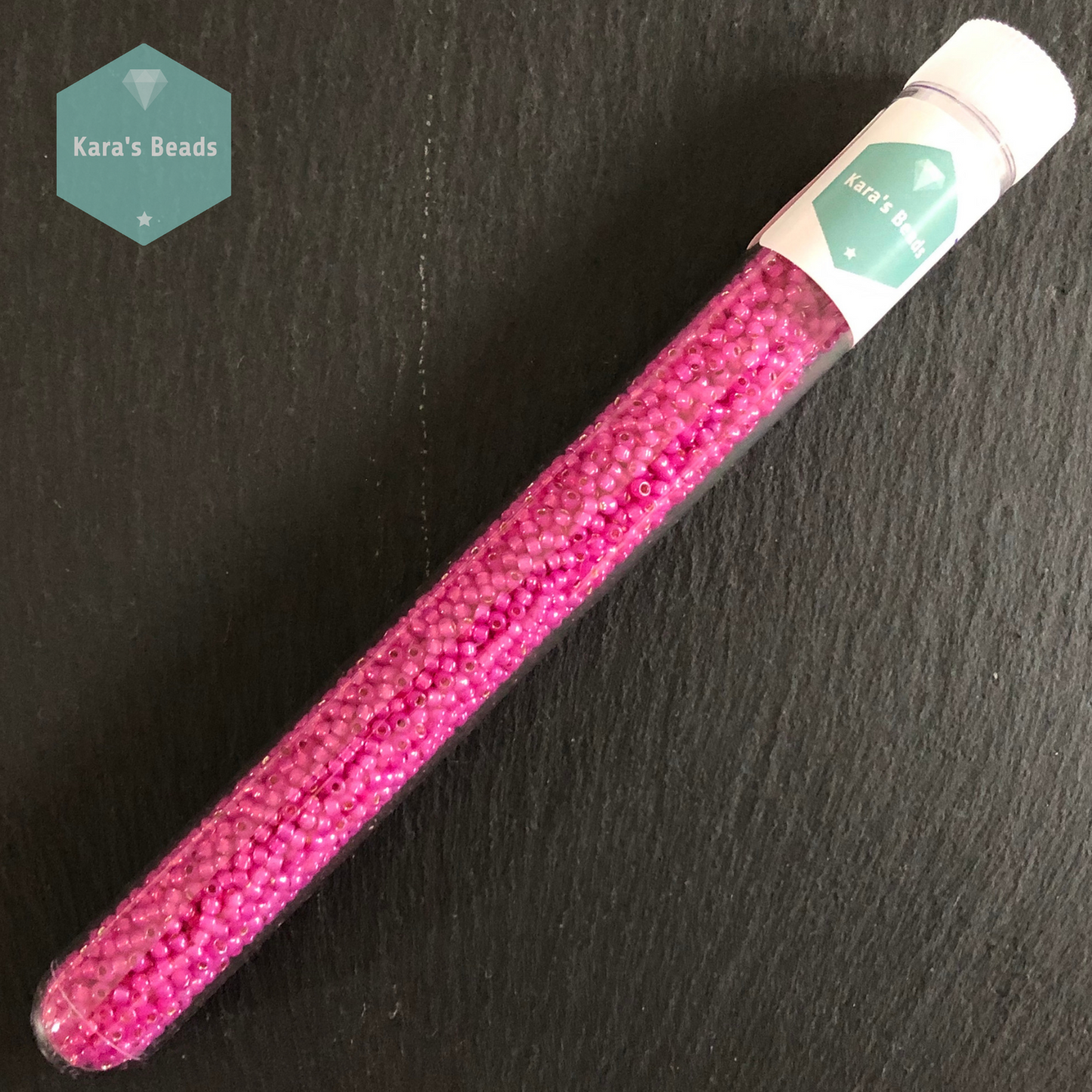 25g Tube 11/0 Toho TR11-2107 Silver Lined Milky Hot Pink