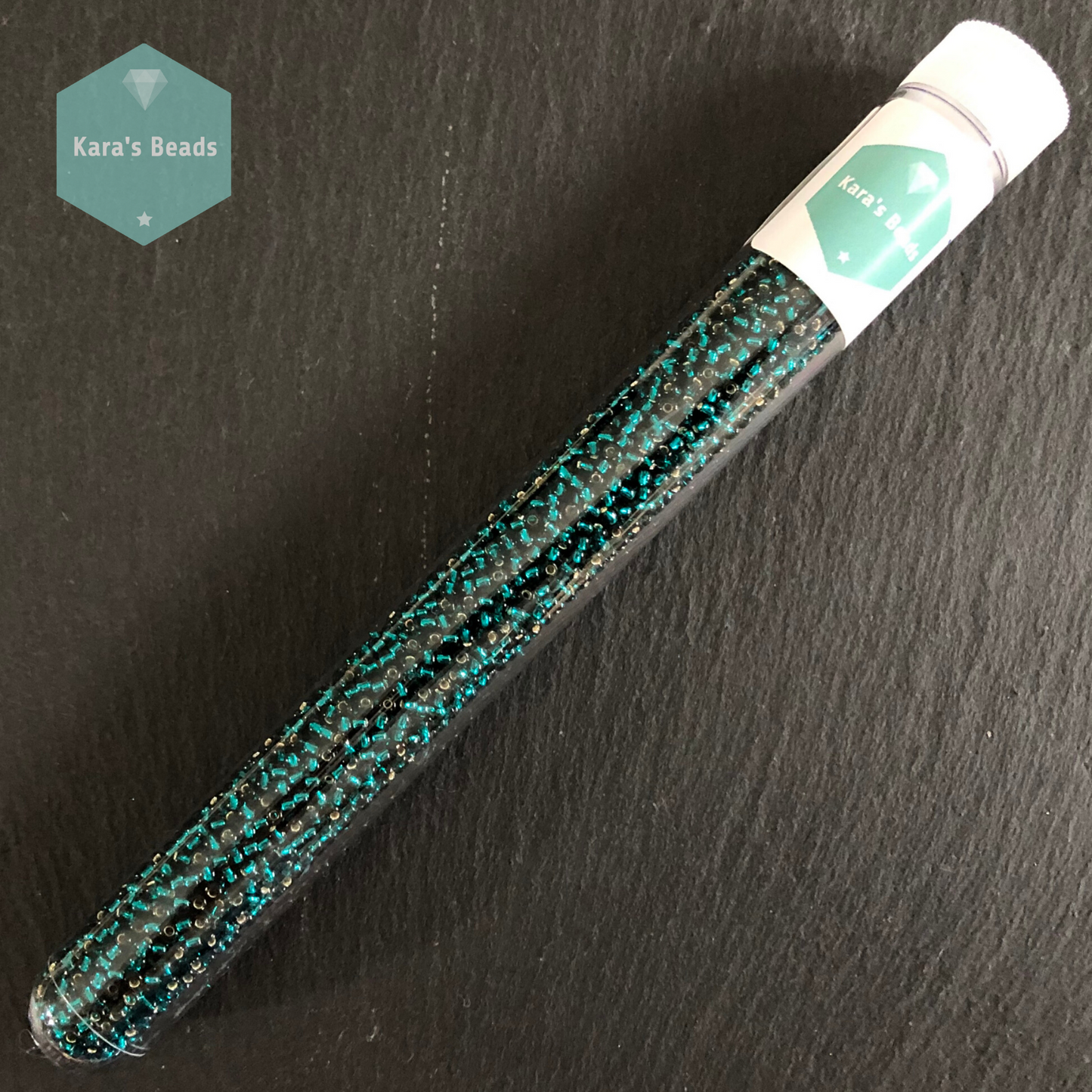 25g Tube 11/0 Toho TR11-27BD Silver Lined Teal