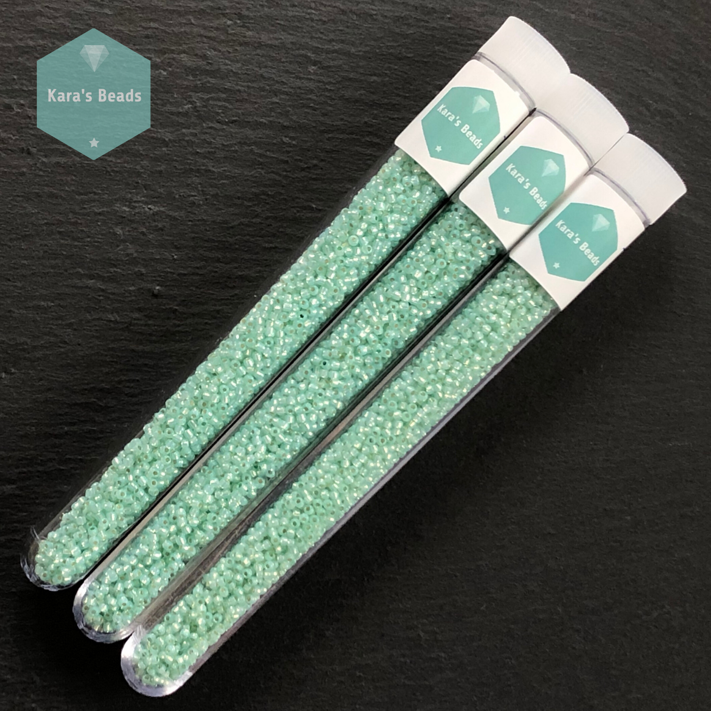 25g Tube 11/0 Toho TR11-2118 Silver Lined Milky Light Peridot