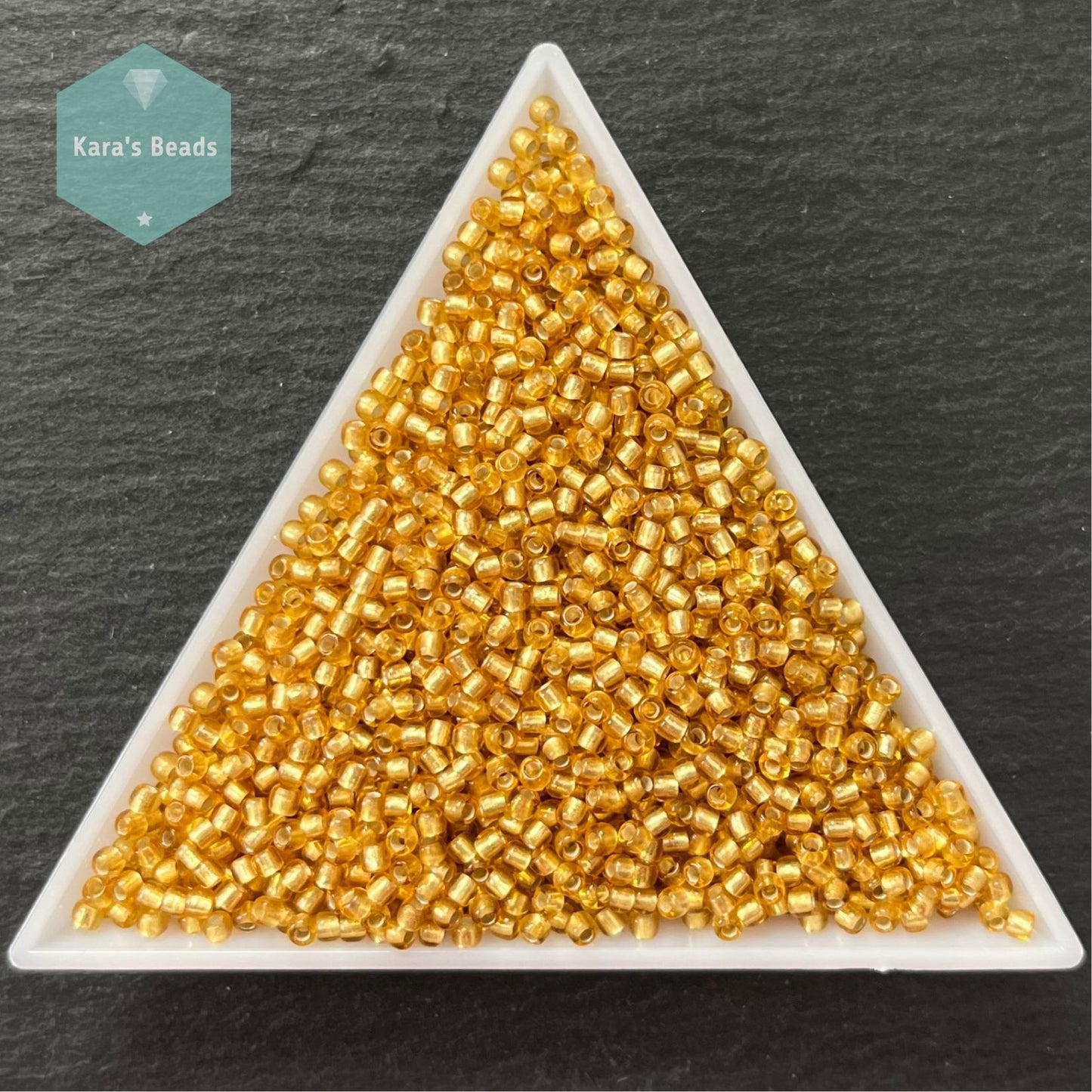 25g Tube 11/0 Toho TR11-22BF Silver Lined Frosted Topaz