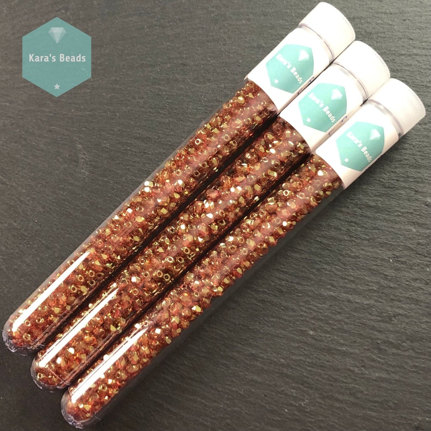 300pcs Tube 4mm Fire Polish 00030/15695 Crystal Lila Gold Luster