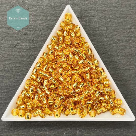 23g Tube 6/0 Toho TR6-22B Silver Lined Medium Topaz