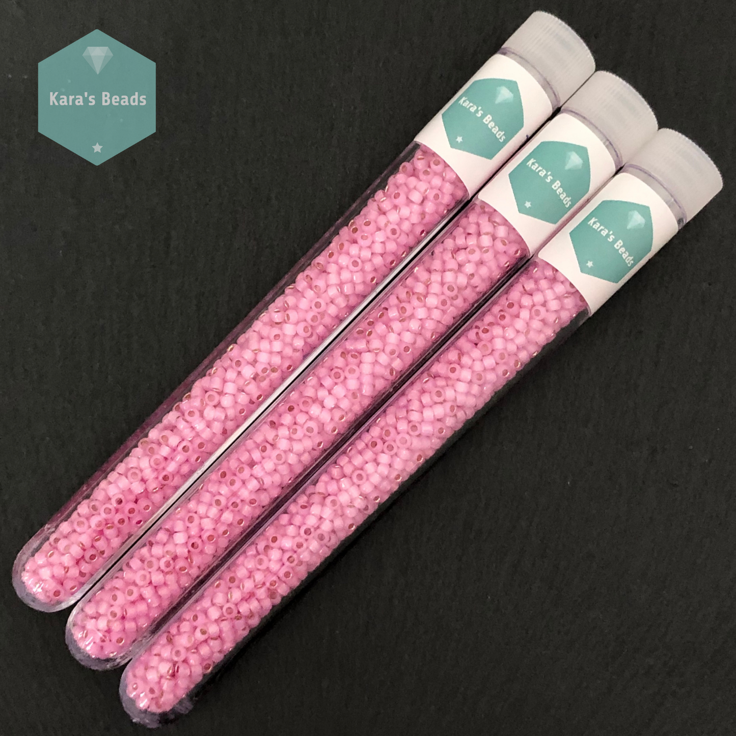 25g Tube 8/0 Toho TR8-2105 Silver Lined Milky Rosaline