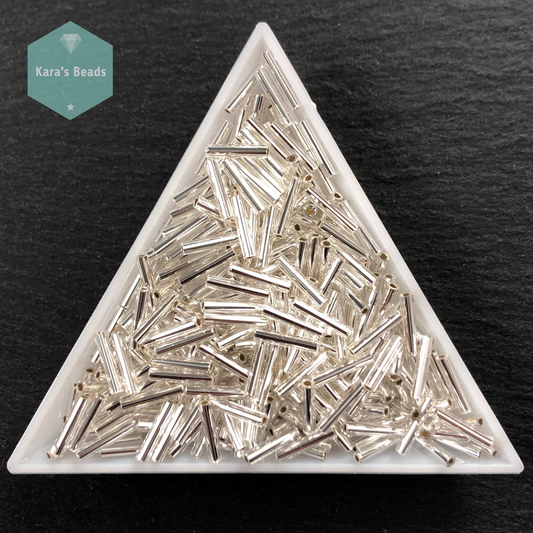 18g Tube 9mm Toho Bugles TB3-21 Silver Lined Crystal