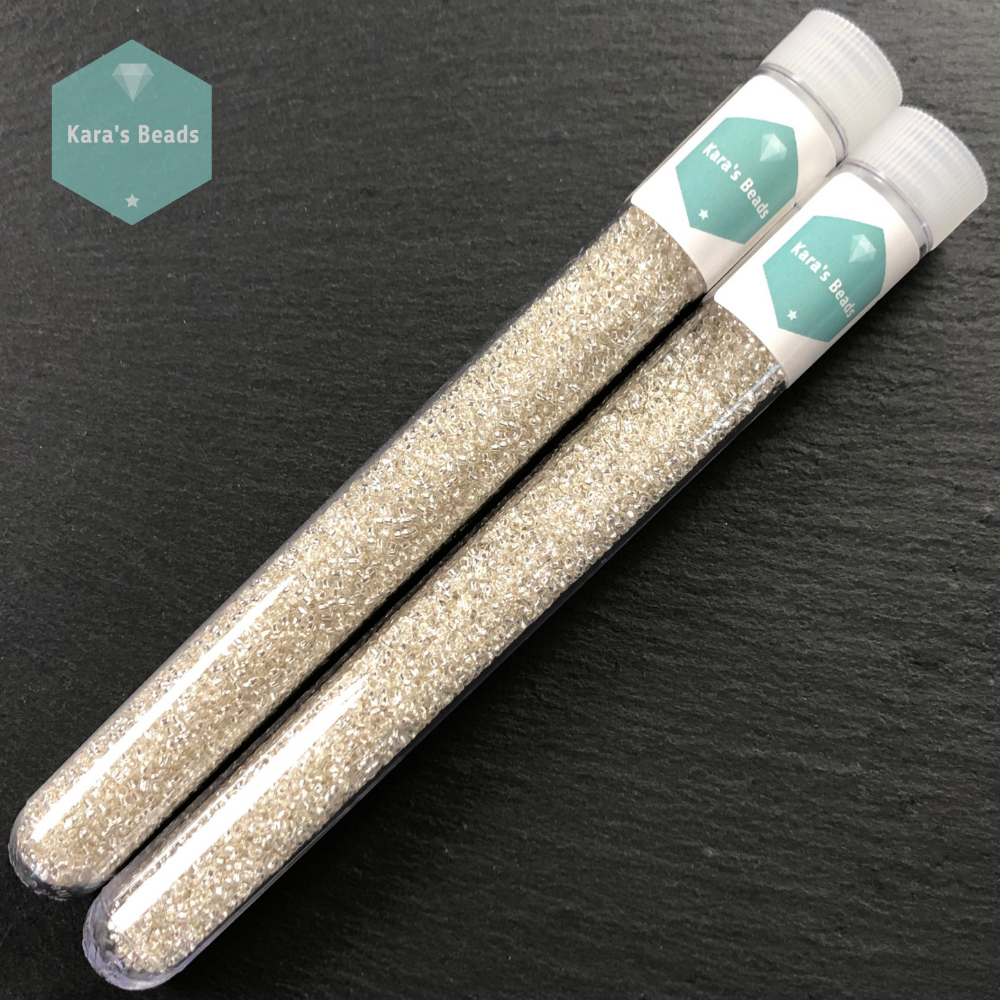 25g Tube 15/0 Toho TR15-21 Silver Lined Crystal