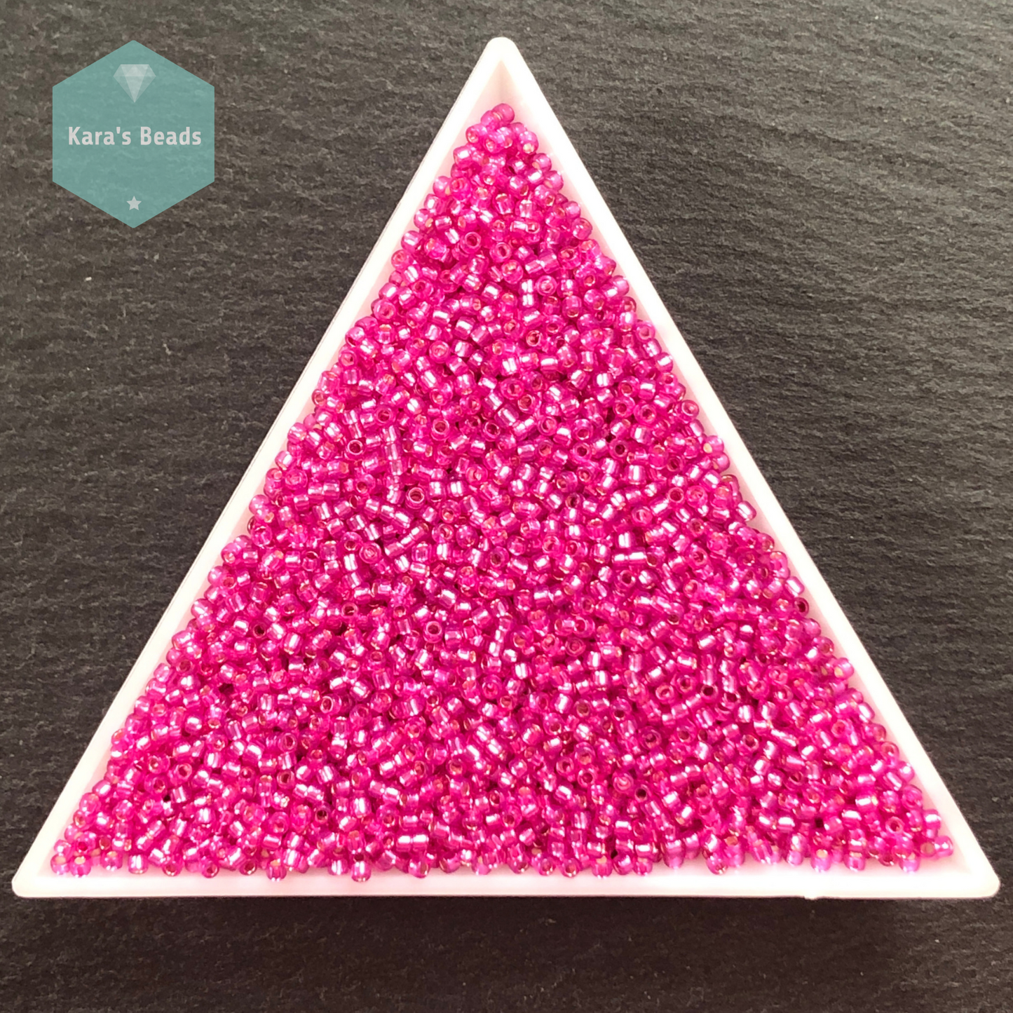 25g Tube 15/0 Toho TR15-2107 Silver Lined Milky Hot Pink