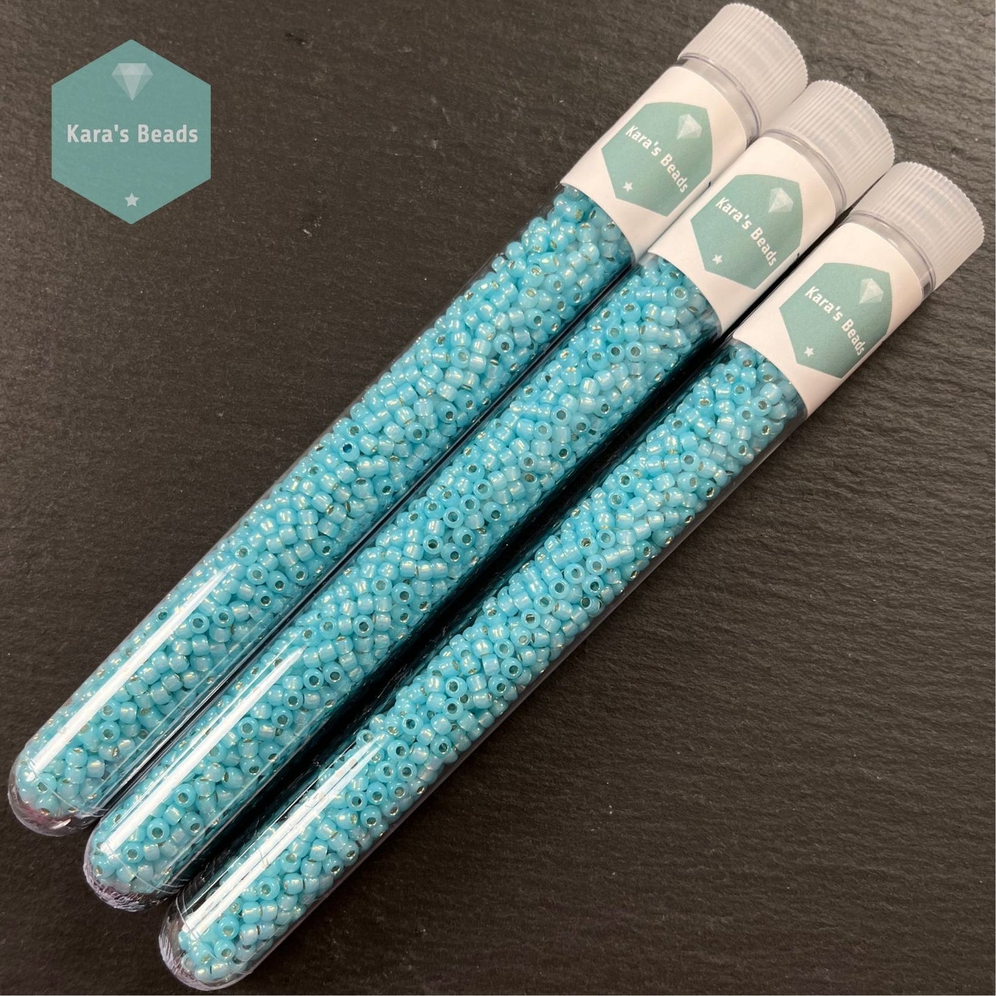 25g Tube 8/0 Toho TR8-2117 Silver Lined Milky Aqua