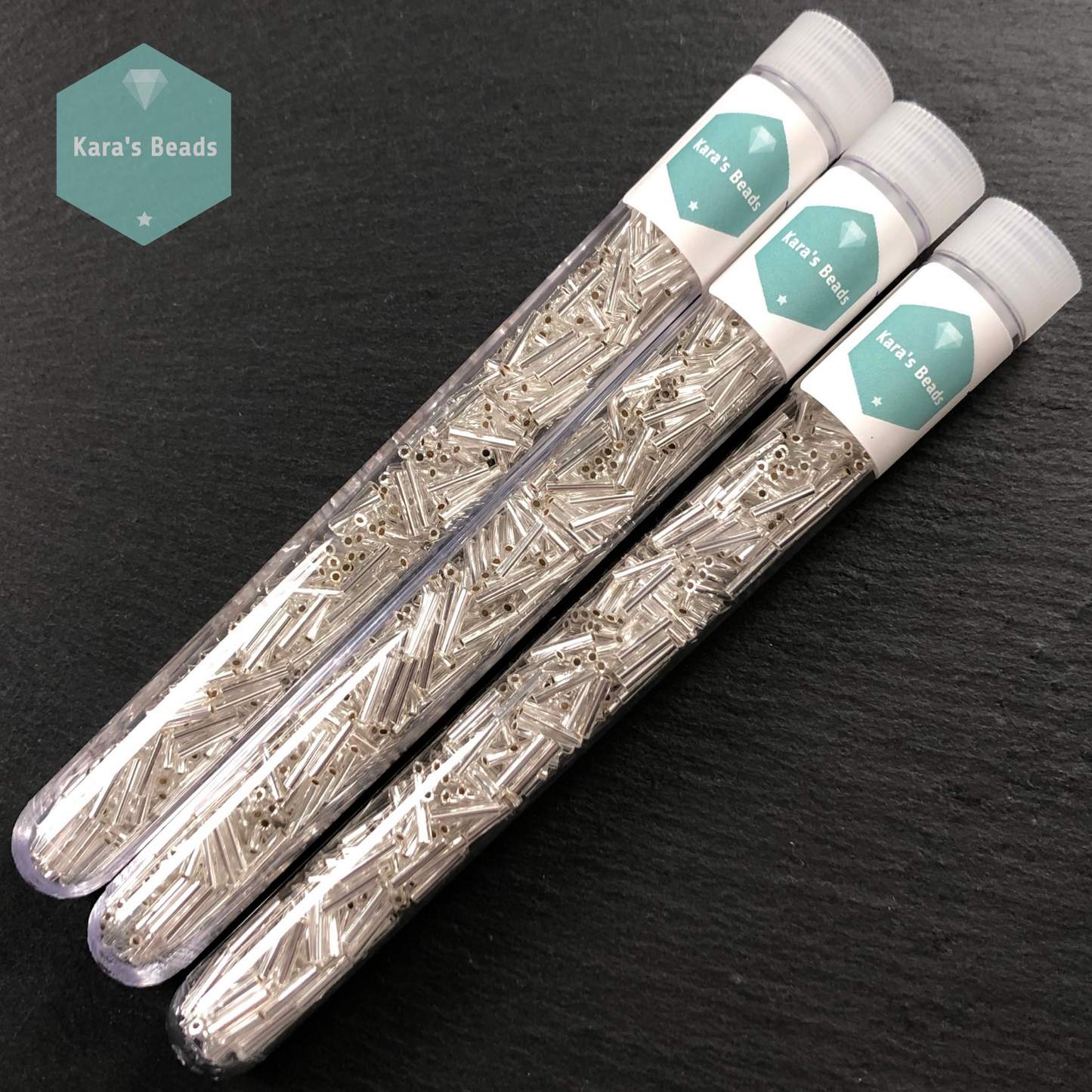 18g Tube 9mm Toho Bugles TB3-21 Silver Lined Crystal