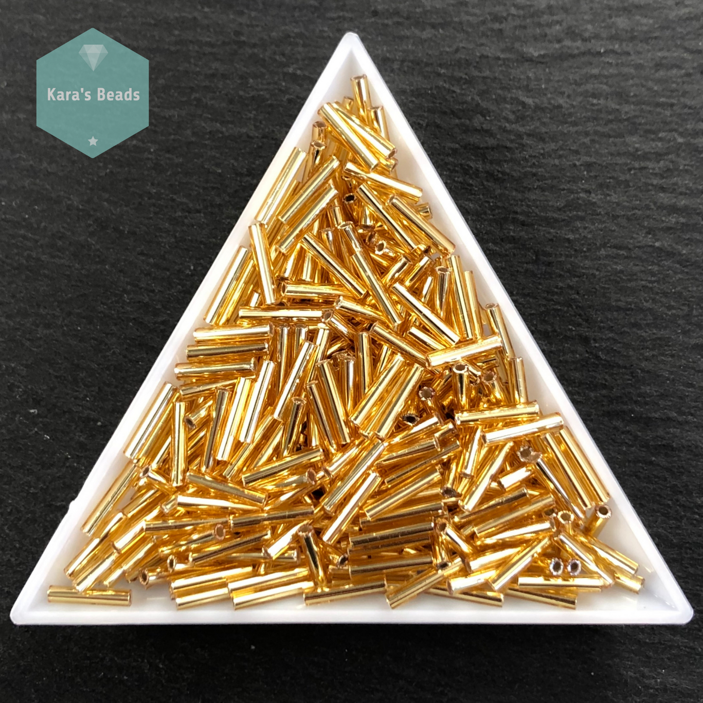 18g Tube 9mm Toho Bugles TB3-22B Silver Lined Medium Topaz